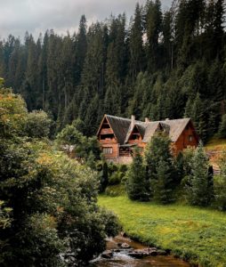 home in the mountains with pine trees